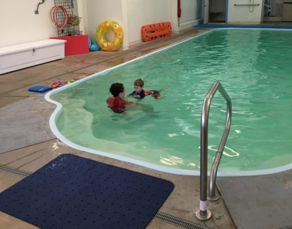 school with swimming pool near me